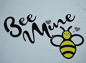 Image depicting the downloadable cut file that says "Bee Mine" with a cute bee