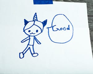 The original image to be traced- it is a child's sketch of a girl with a unicorn horn saying "Good"