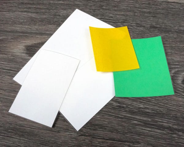 The different HTVs after being cut and before being weeded- they are multi colored rectangles