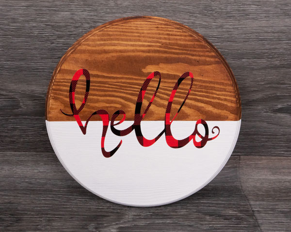 The finished door hanger fully painted with the words "hello" in Red Buffalo Plaid SpecialtyPSV Fashion Patterns