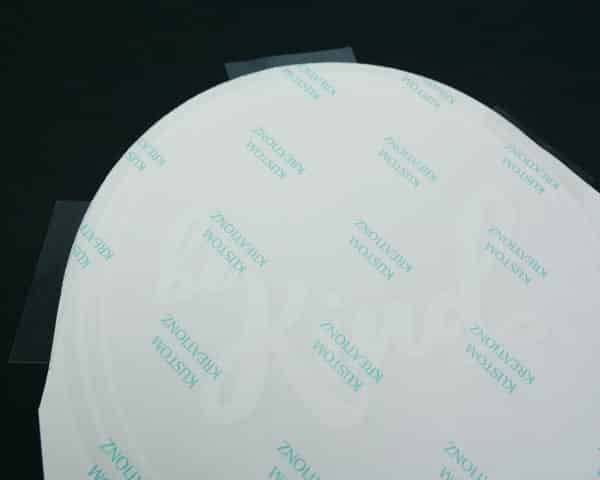 The sublimation paper lined up on the GlitterFlex Ultra and taped down with ThermoTape